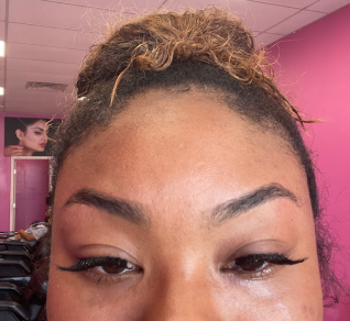 Image of a customer after they did thier Eyebrows at The Best Threading Salon
